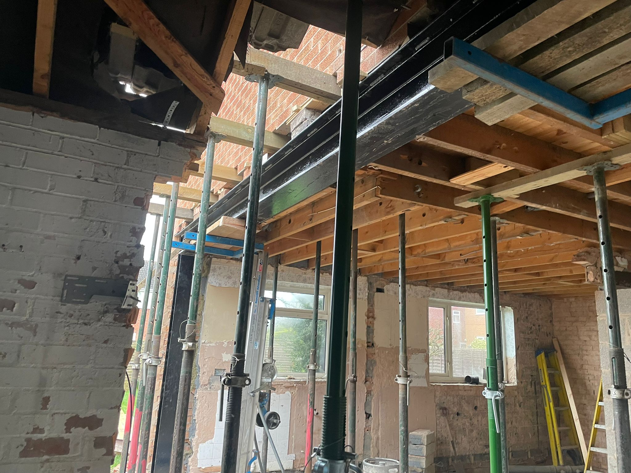 Steel beam installation during residential alteration works