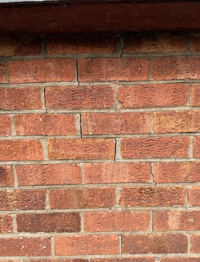 Cracking in external masonry inspected by a structural engineer
